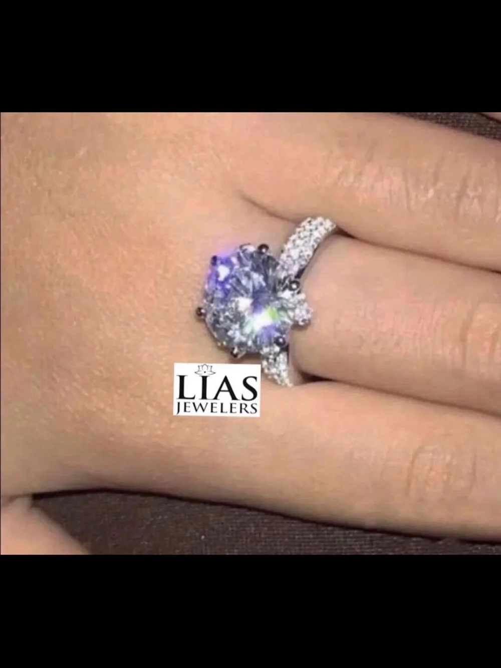 New 18k white gold engagement ring